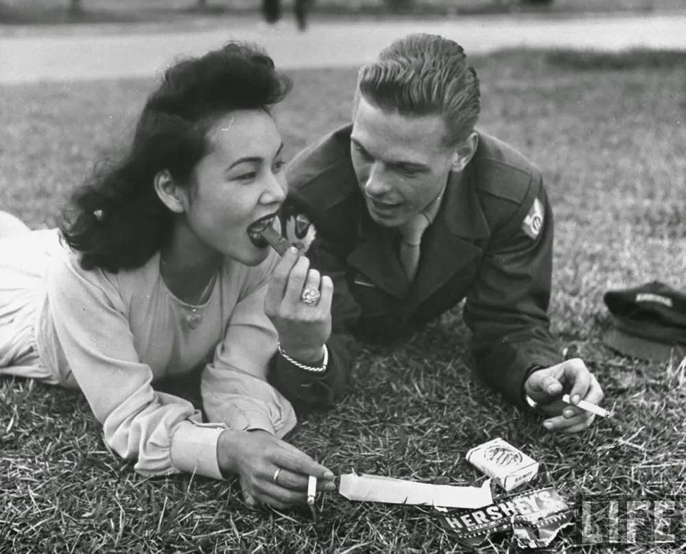 #27 An American soldiers with a new friend in the occupied Japan.
