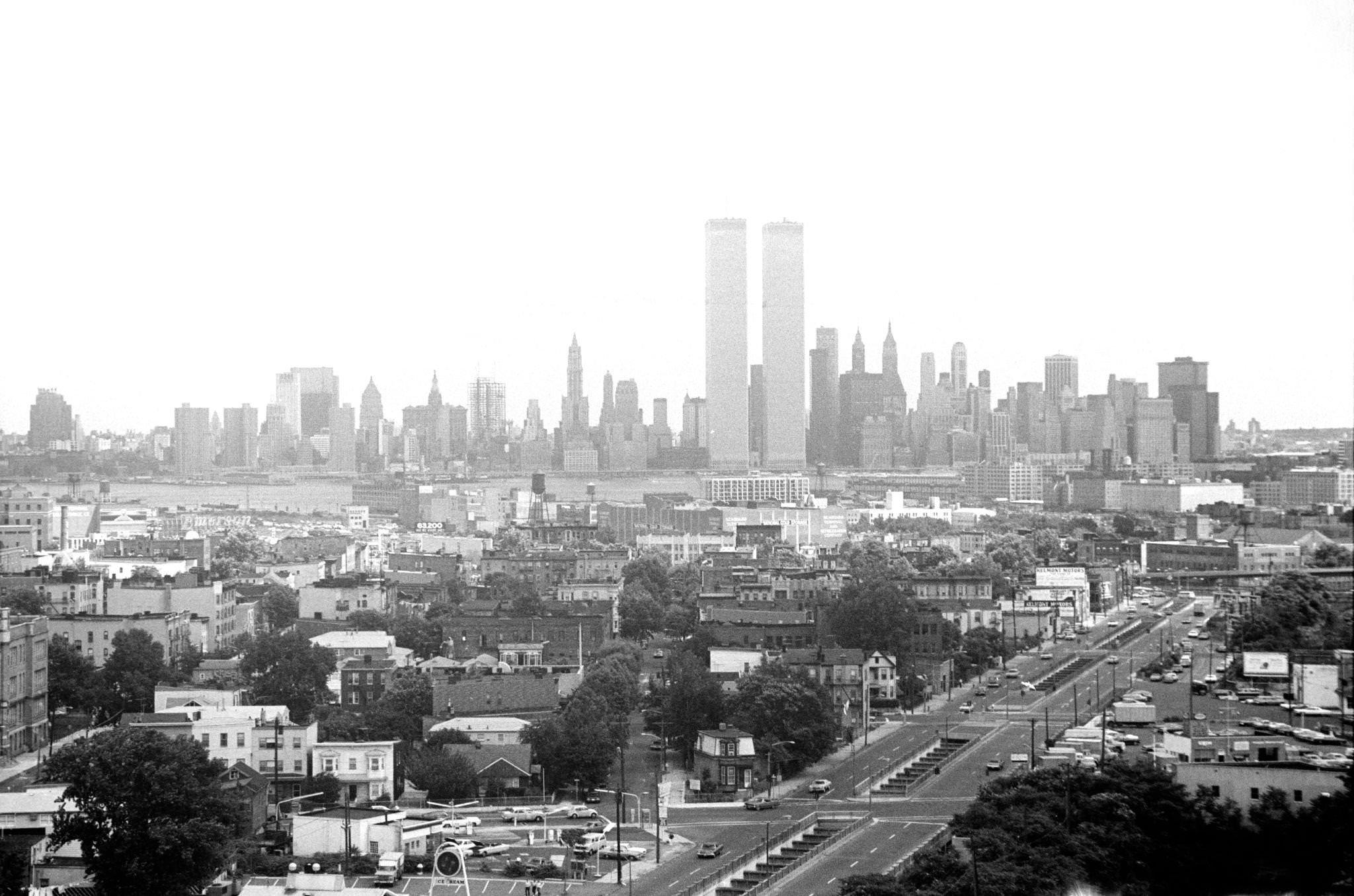 #2 Aerial view, looking east, with the World Trade Center and the New York City skyline in the distance, of Montgomery Street in downtown Jersey City, New Jersey, 1974.