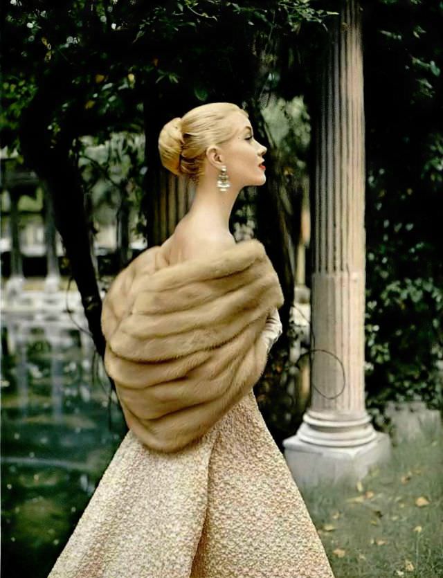 #21 Model in Desert Gold EMBA mink stole by Max Reby, gold matelasse gown by Grès, 1957