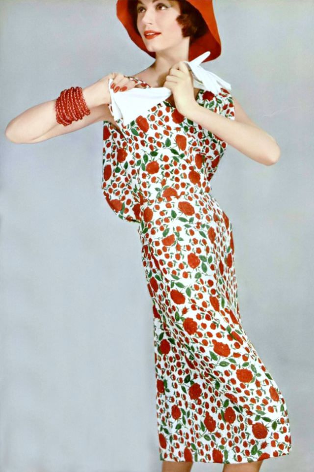 #31 Simone d’Aillencourt in pretty floral silk print dress with a blouson top by Grès, 1958