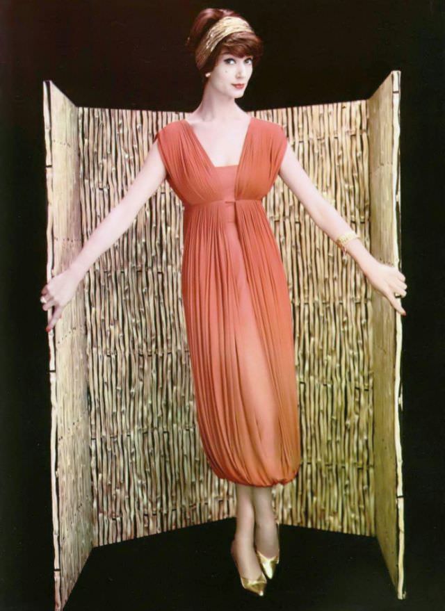 #32 Simone d’Aillencourt in silk jersey dress draped and pleated by Grès, 1958