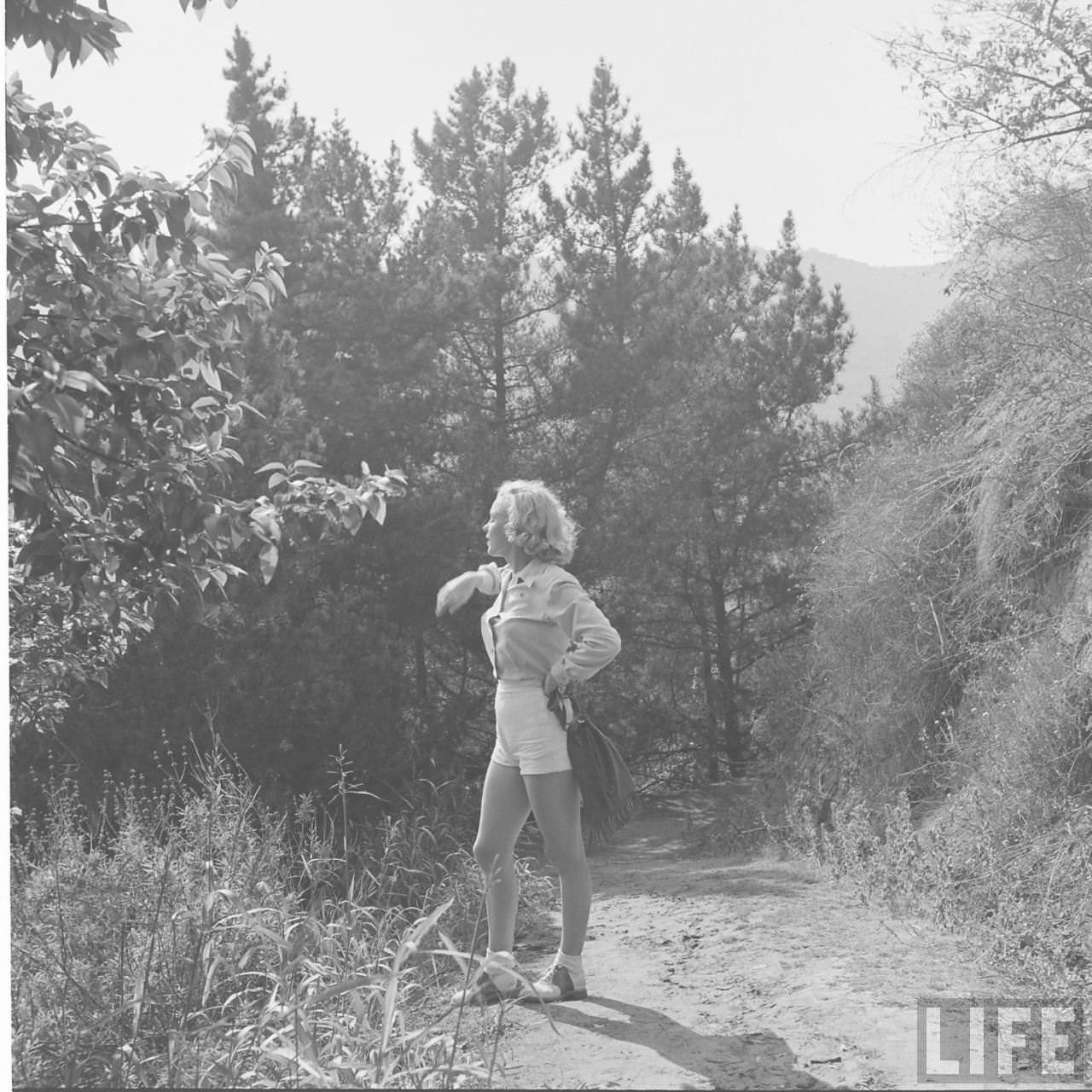 The Girl Next Door: Iconic Photographs of Marilyn Monroe Hiking in the Woods, 1950 Celebrities