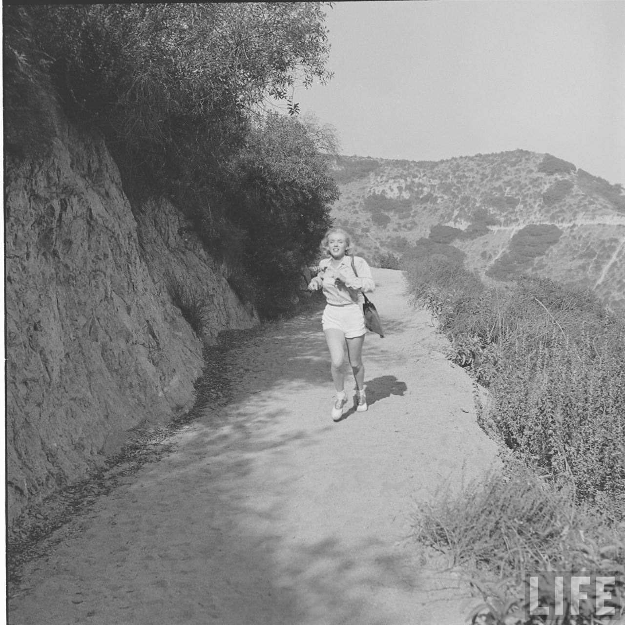The Girl Next Door: Iconic Photographs of Marilyn Monroe Hiking in the Woods, 1950 Celebrities