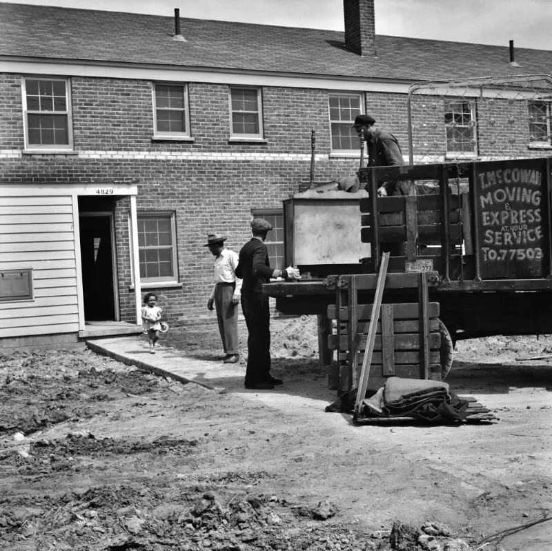 #20 First Black family moving into the Sojourner Truth neighborhood, Detroit, Michigan, 1942.