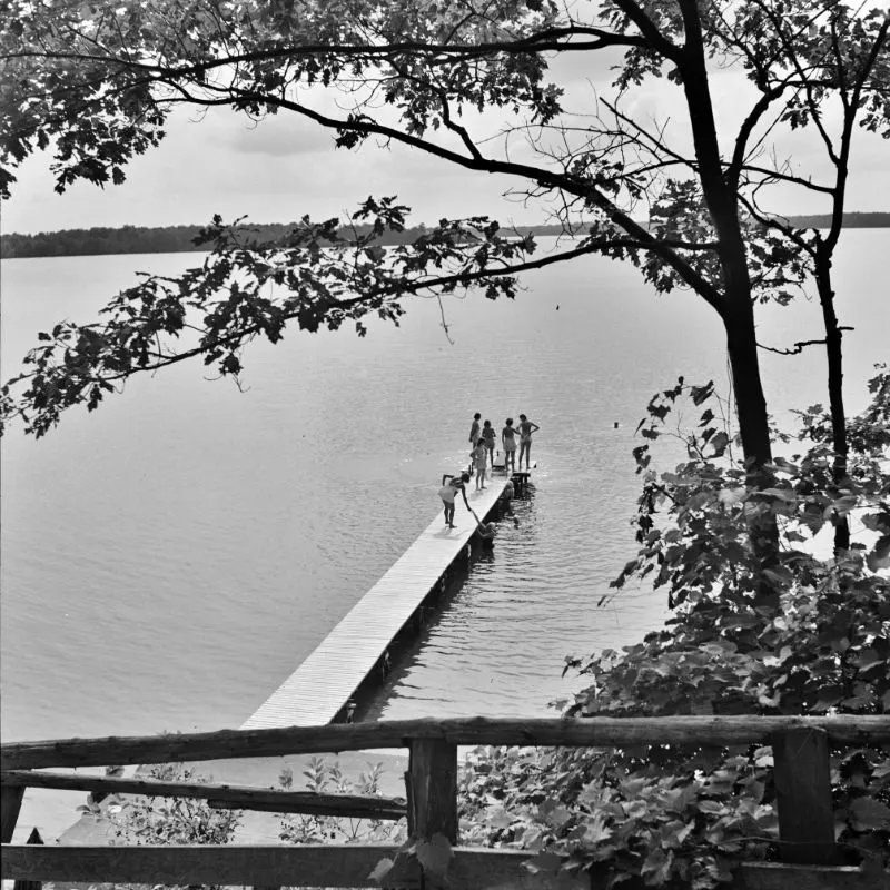 #25 National music camp where 300 or more young musicians study symphonic music for eight weeks each summer. Swimming dock, Interlochen, Michigan, August 1942.
