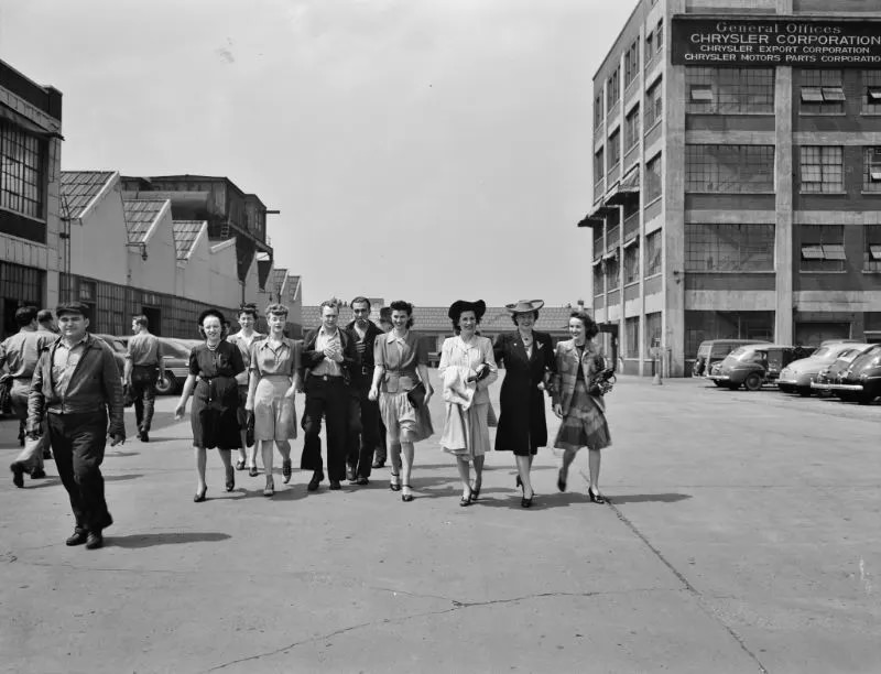 #33 Workers coming out of the Highland Park Chrysler plant, Detroit, Michigan, spring 1942.