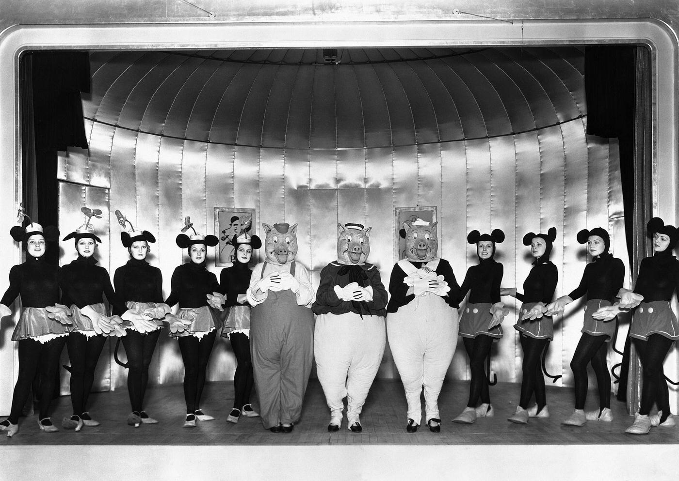 The Monte Carlo Follies, 1934. Mickey Mouse – Hilda Knight, Minnie Mouse – Evelyn Dall, Big bad wolf – Bob Robinson.