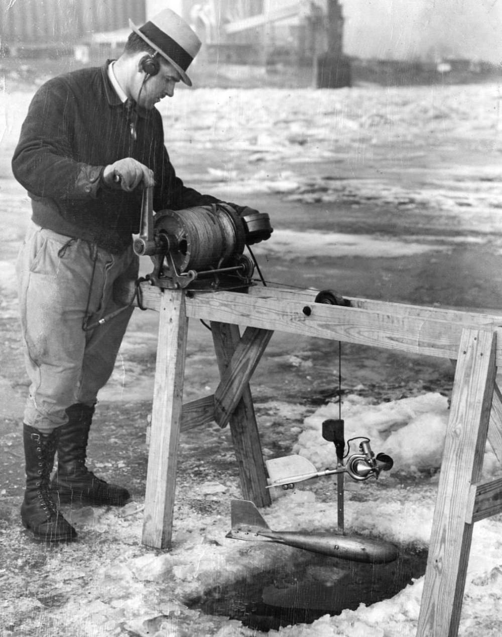 #4 R. D. Schmickle of the U.S. Geological Survey prepares to operate a device that measures the speed of the Mississippi’s current on Feb. 22, 1936.