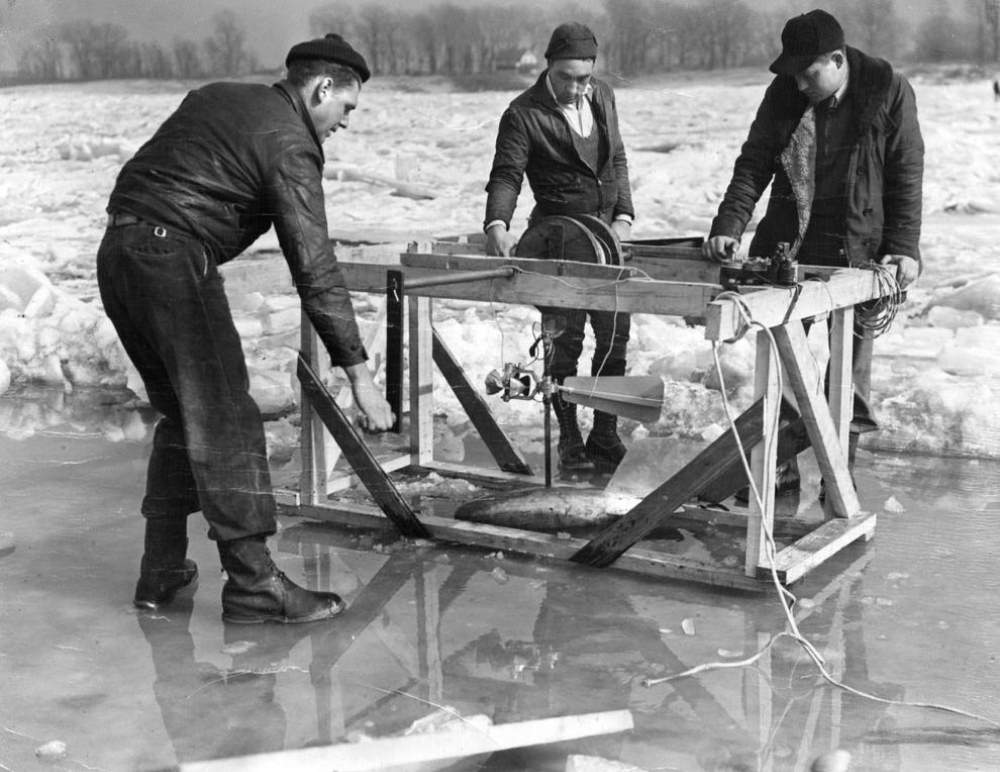 #5 U.S. Geological Survey engineers measure current over the channel on Feb. 22, 1936, near the foot of Davis Street, in Carondelet.