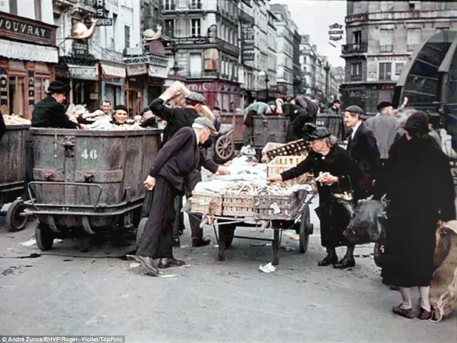 #53 Poorer-looking Parisians at a down-at-heel street market.