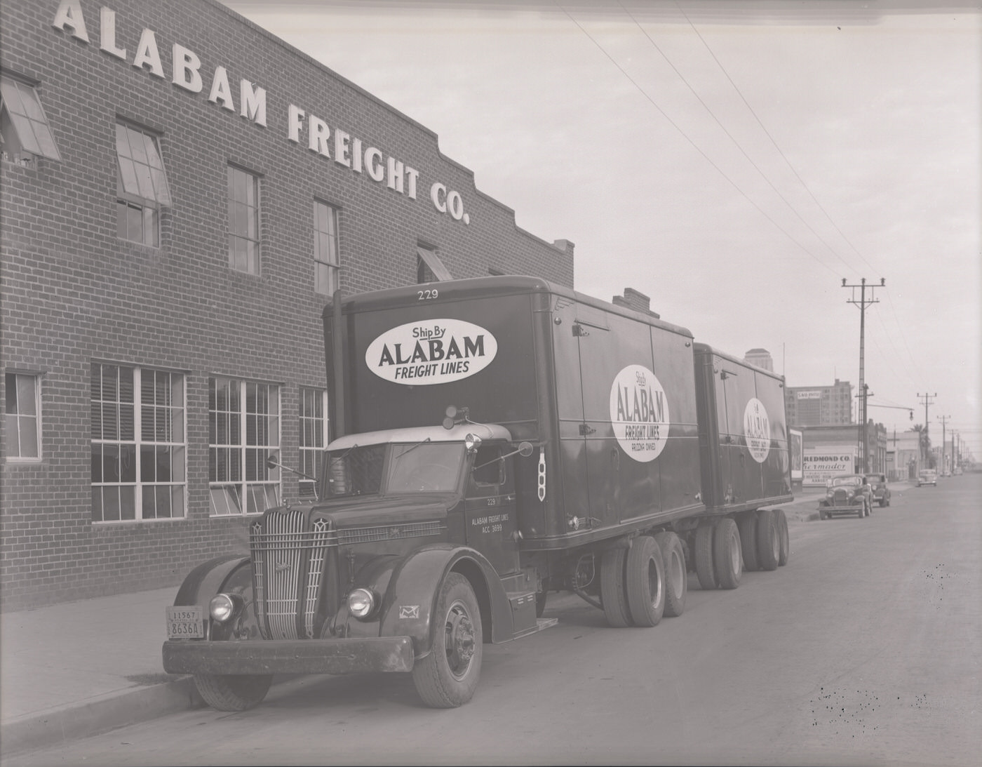 #1 Alabam Trucks Parked Outside the Alabam Freight Company Building, 1930s