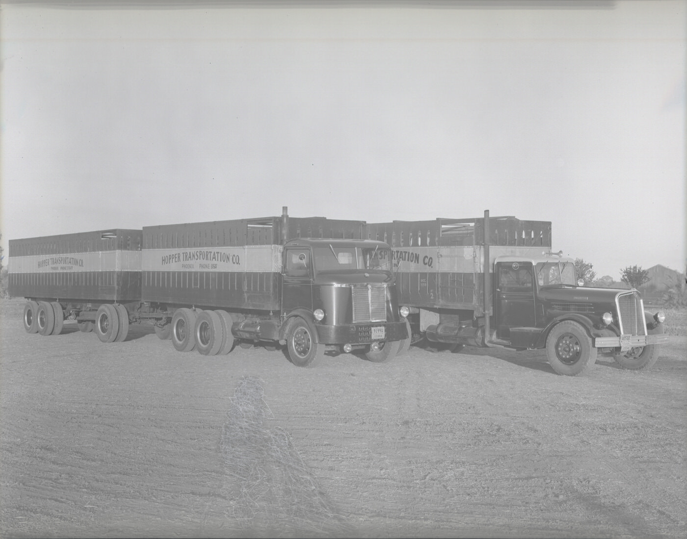 #17 Hopper Transporation Company Trucks, 1930s