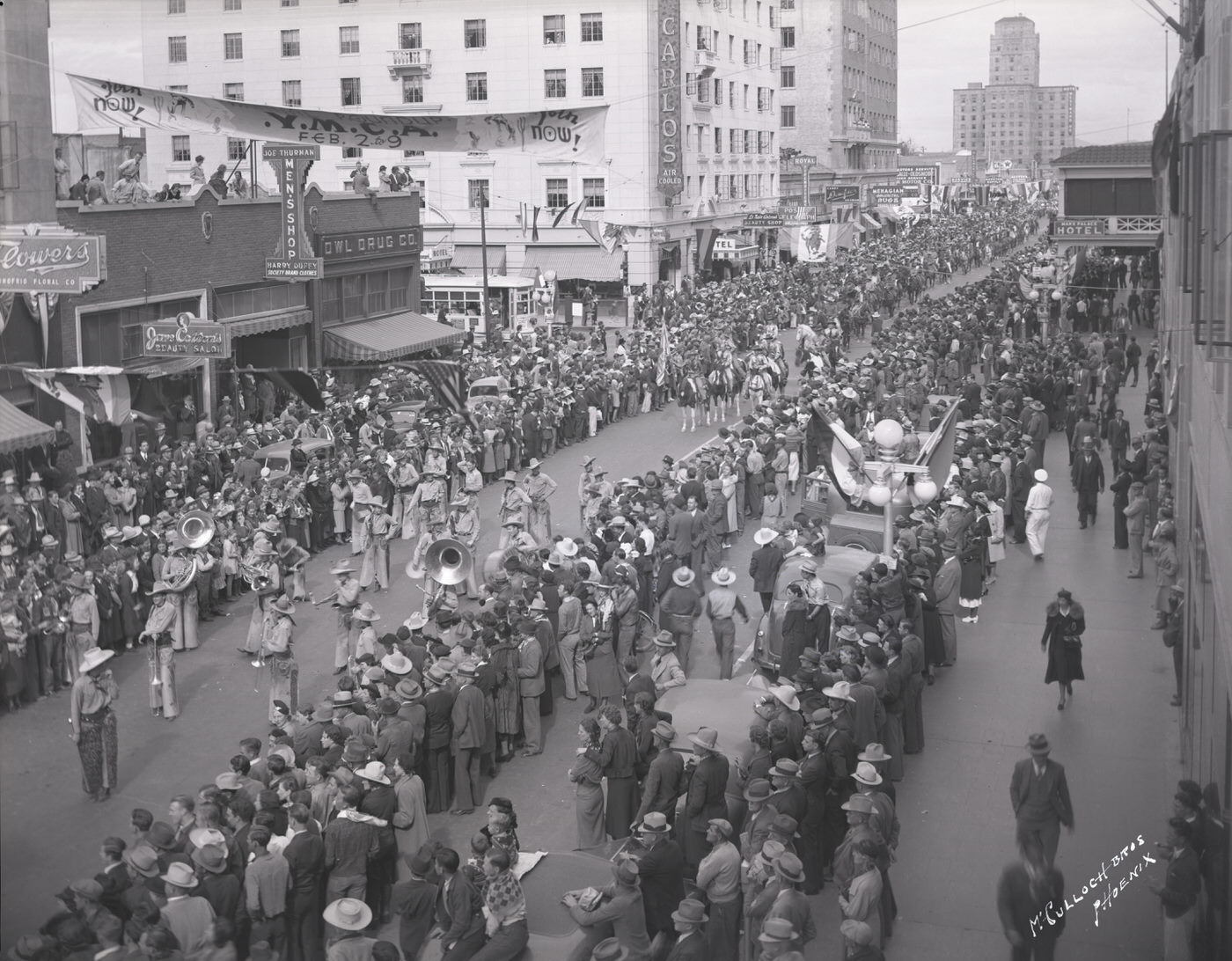 #47 Jaycee Rodeo Parade Moving South on Central Past Monroe, 1930s