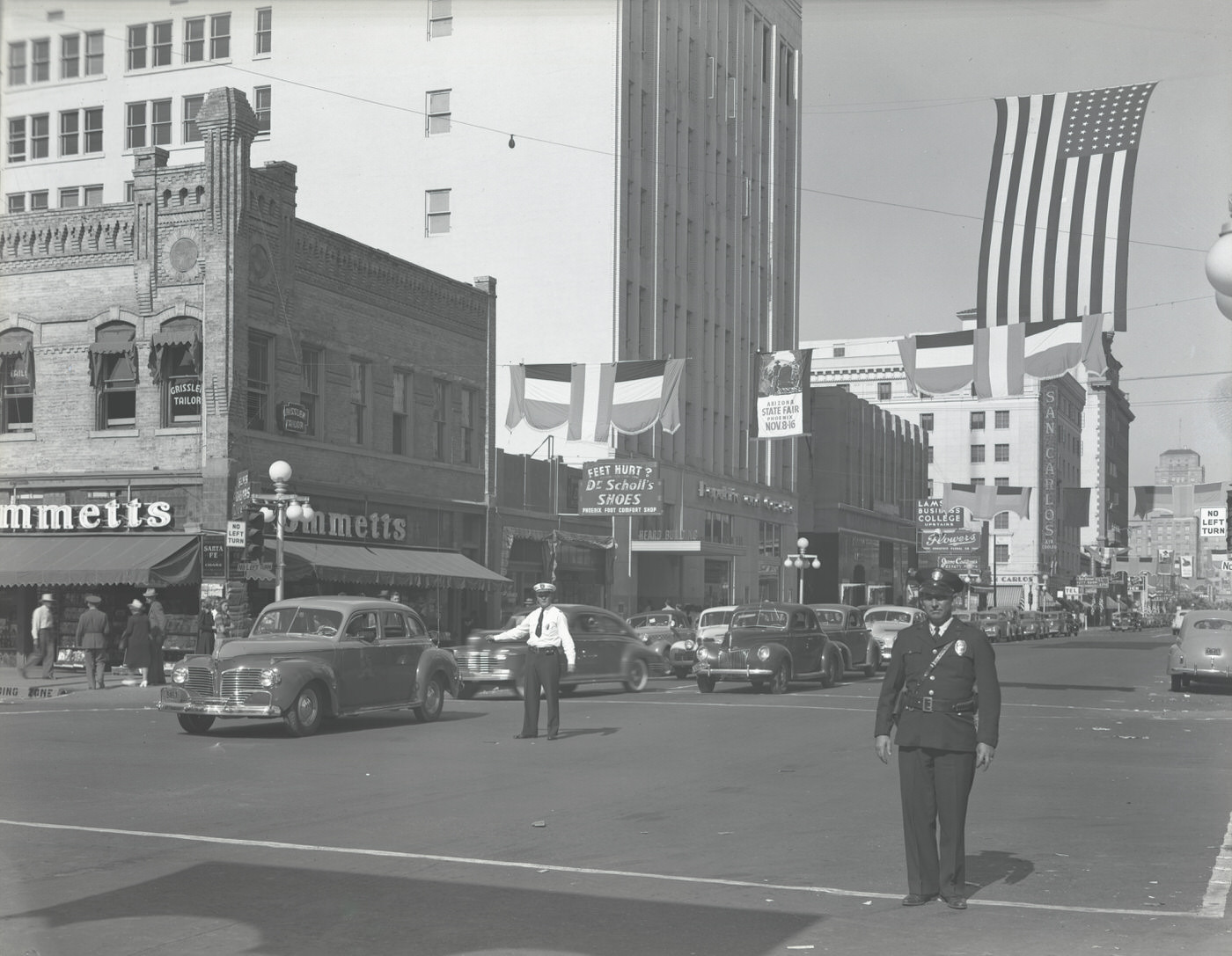 #51 Charlie Thomas and Lebley Mofford Directing Traffic at Central Avenue and Adams Street, 1930s