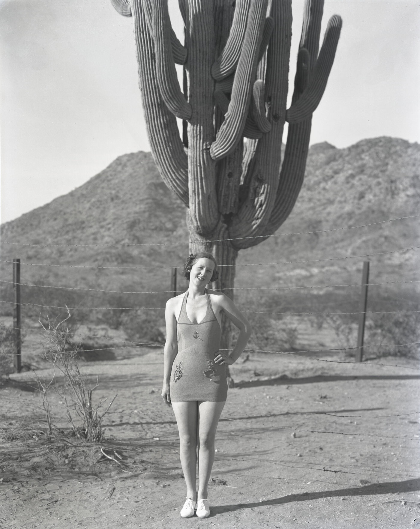 #98 Camelback Inn Guest in Bathing Suit in Front of Cactus, 1930s