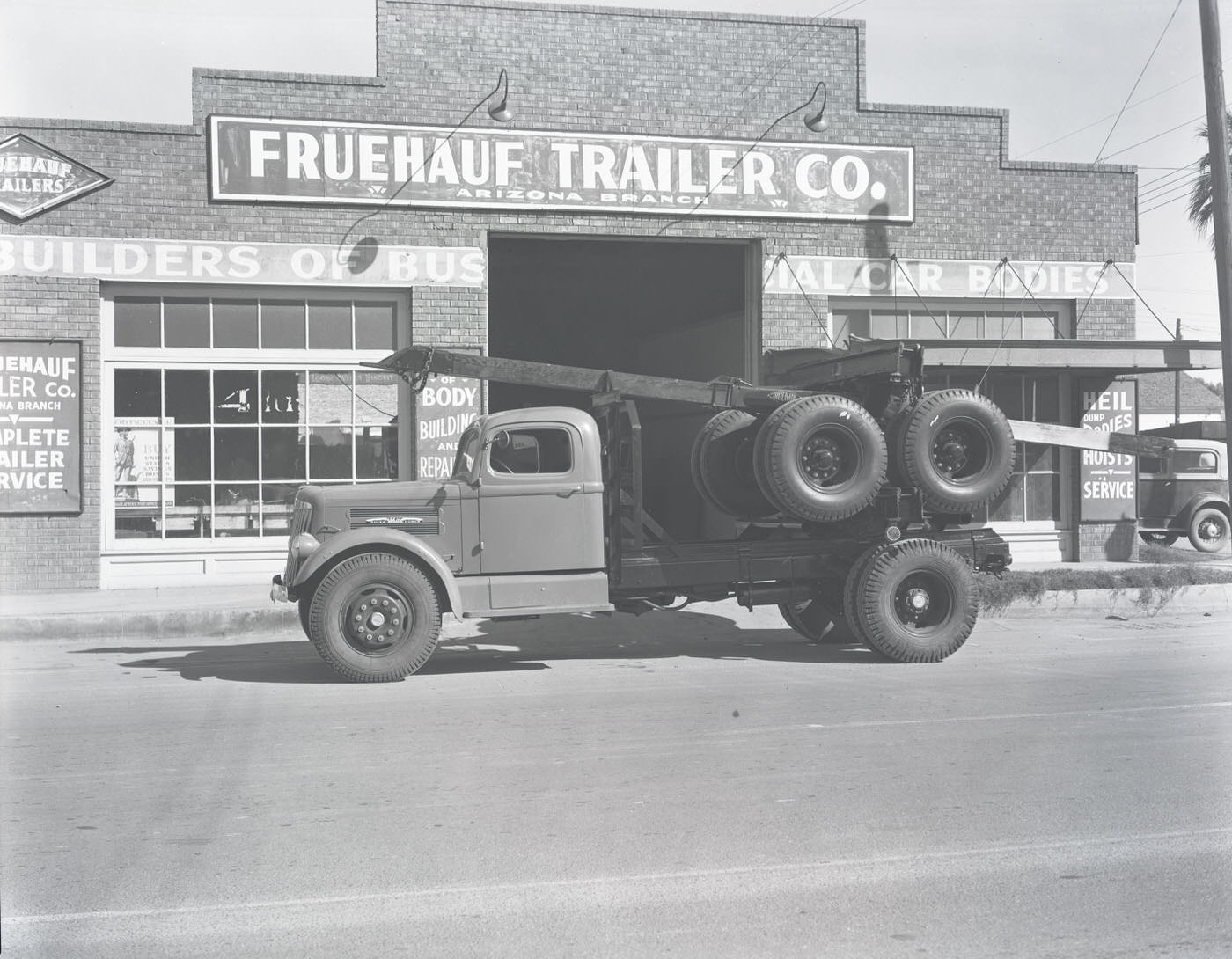 #25 Fruehauf Trailer Co. Building Exterior and Truck, 1941