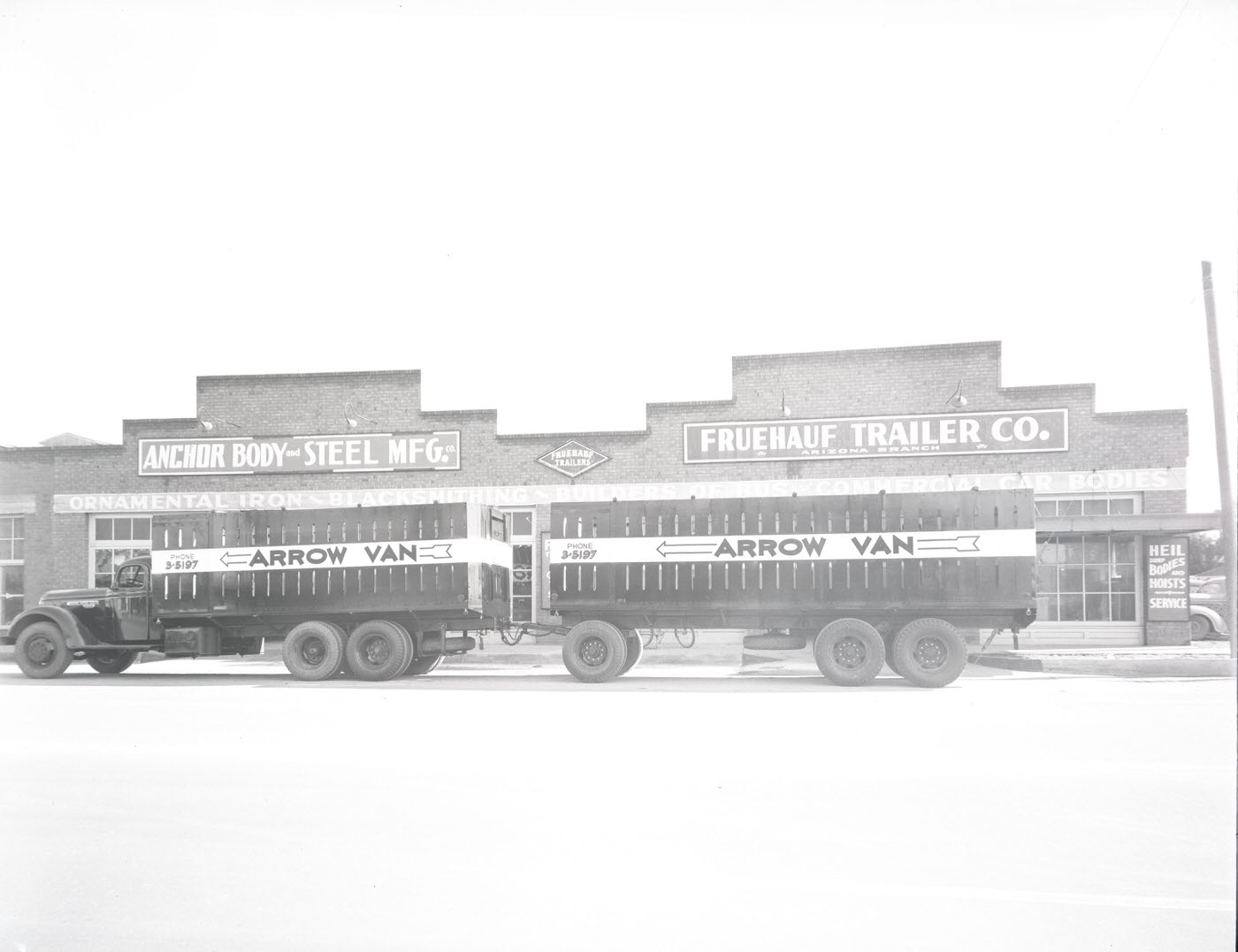 #26 Fruehauf Trailer Co. Building Exterior and Trucks, 1941