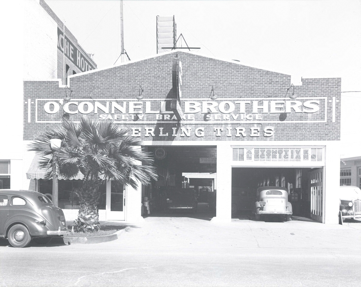 #54 O’Connell Brothers Automobile Repair Shop Exterior, 1941