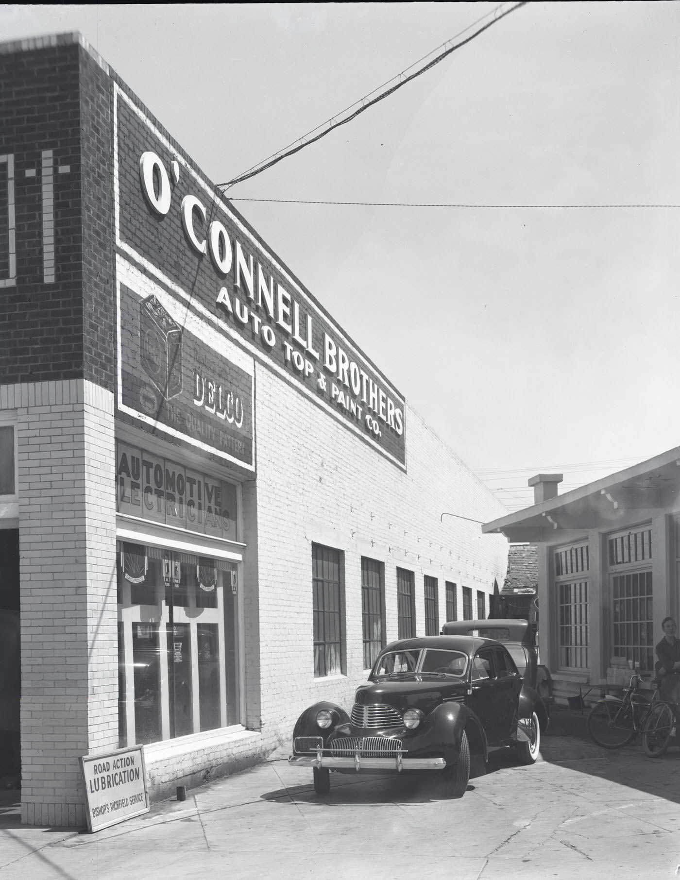 #55 O’Connell Brothers Automobile Repair Shop Exterior, 1941