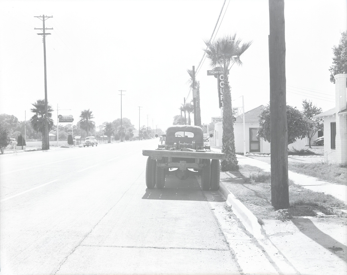 #25 4100 Block of E. Van Buren Street. View looking west. Thompson’s Auto Court (4100 E. Van Buren) is visible, 1943