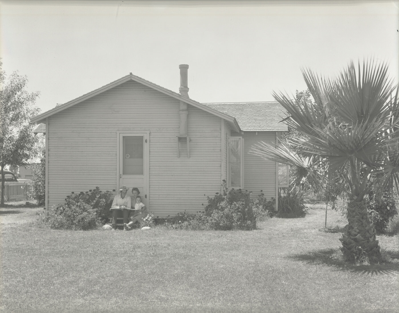 #50 Family in Front of a Ranch House., 1943