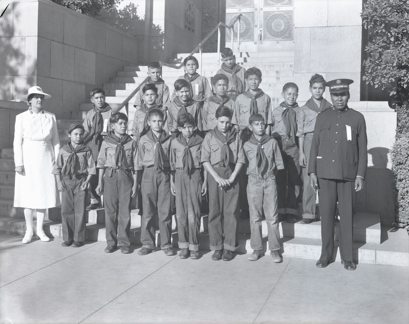 #53 Man, Woman, and Male Salvation Army Scouts on Steps, 1943