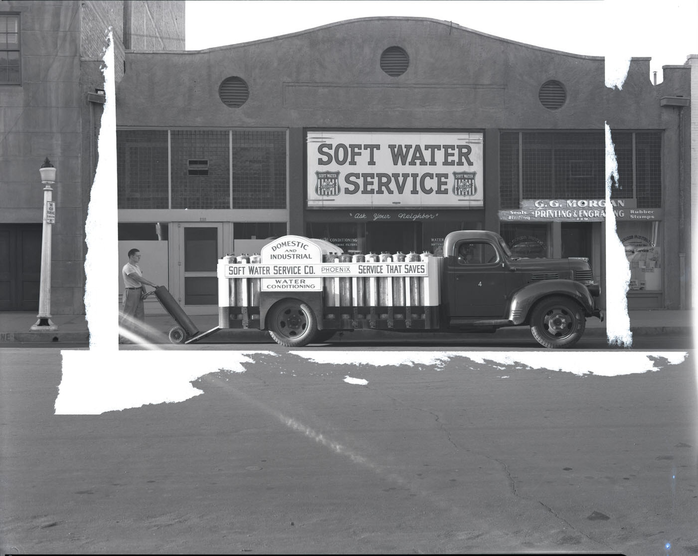 #27 Soft Water Service Co. Building Exterior and Truck, 1944