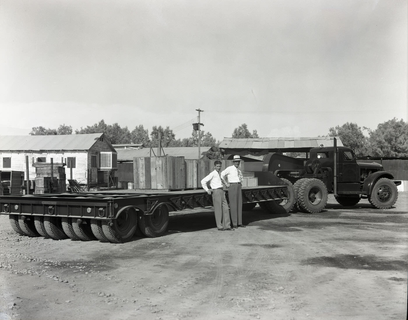 #20 Men Standing by Truck, 1945