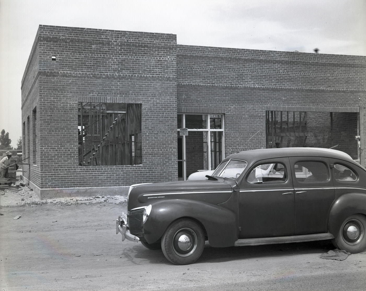 #31 Building Exterior and Car, 1945