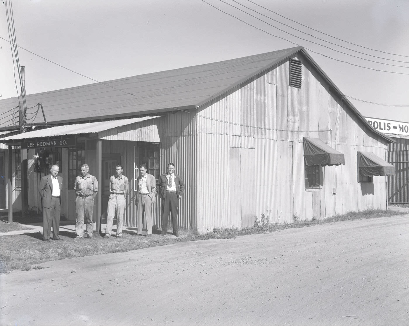 #34 Lee Redman Co. Employees in Front of Building, 1945