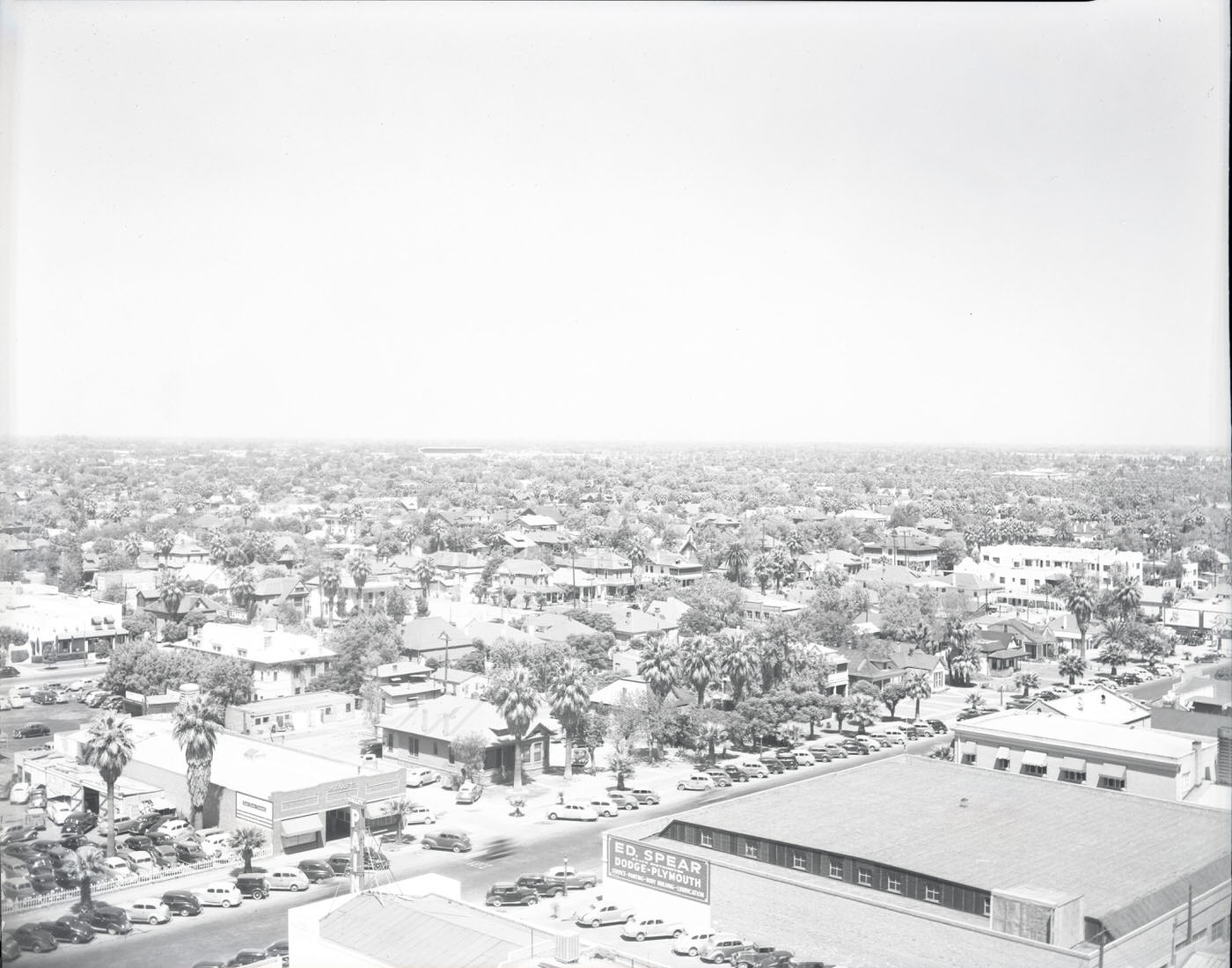 #3 Cityscape of Phoenix, 1946. View looking south from the 300 block of N. 1st St. taken from a rooftop located at approximately the intersection of Central and Van Buren. Ed. Spear Dodge-Plymouth is visible.