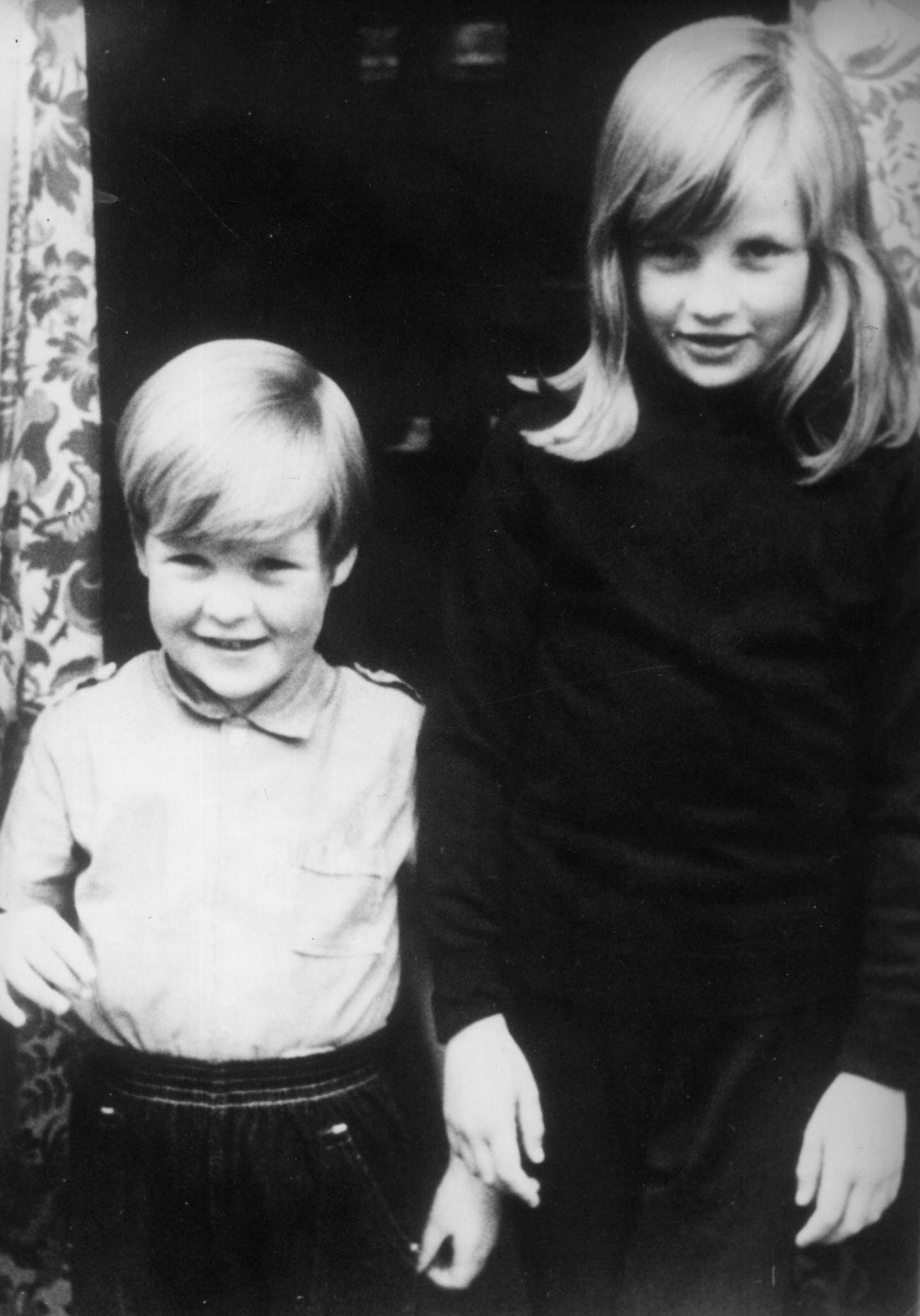 #8 Lady Diana with her brother Charles, Viscount Althorp, at their home in Berkshire, 1968