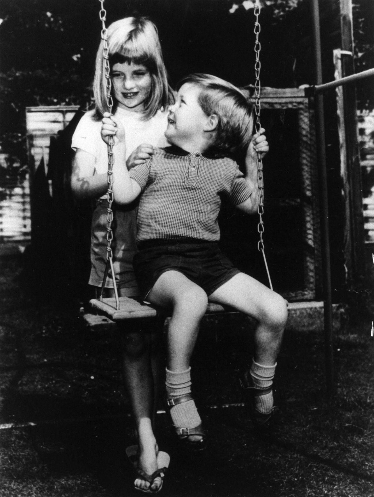 #9 Lady Diana Frances Spencer playing with her brother Charles Edward Maurice.