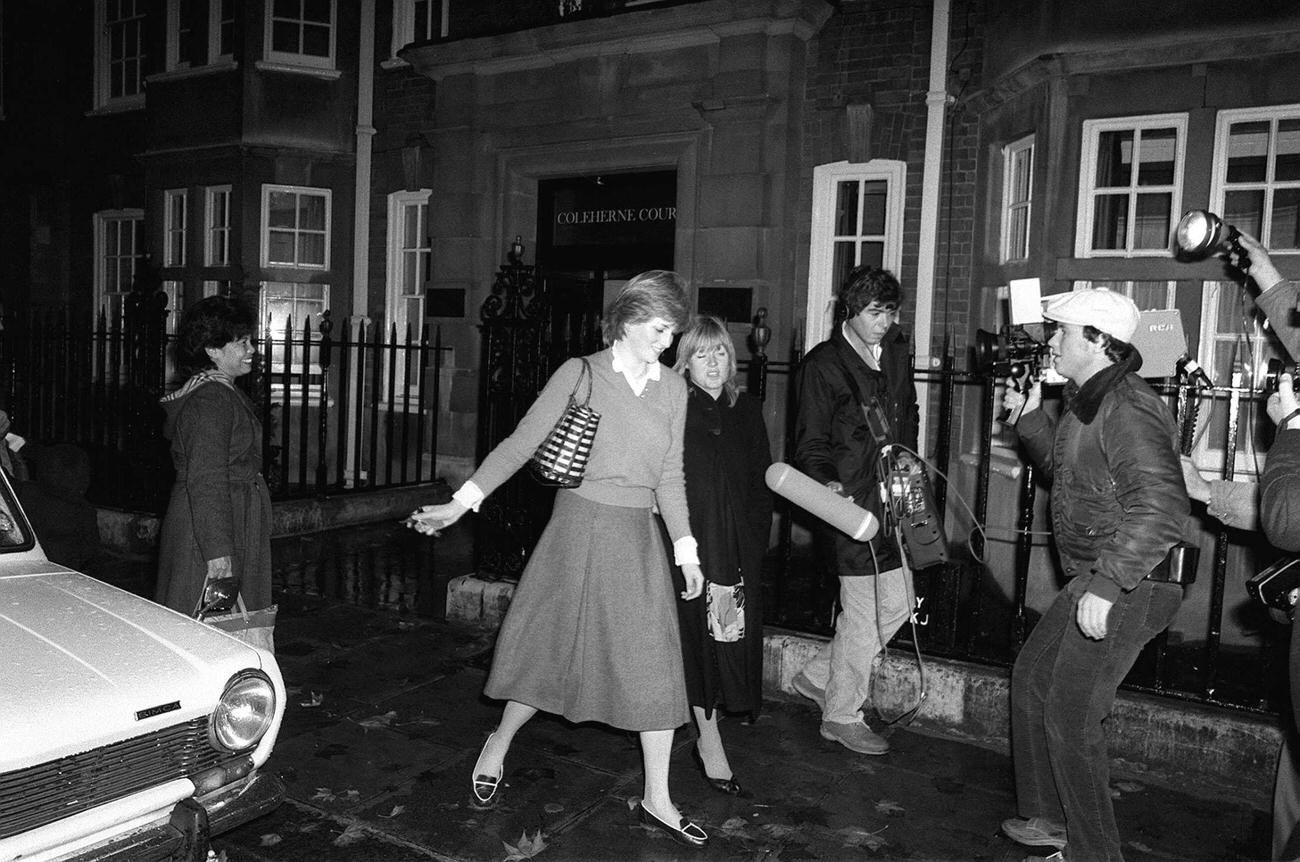 #31 Lady Diana Spencer who is engaged to Prince Charles is hounded by the media at her flat in Coleherne Court in November 1980.