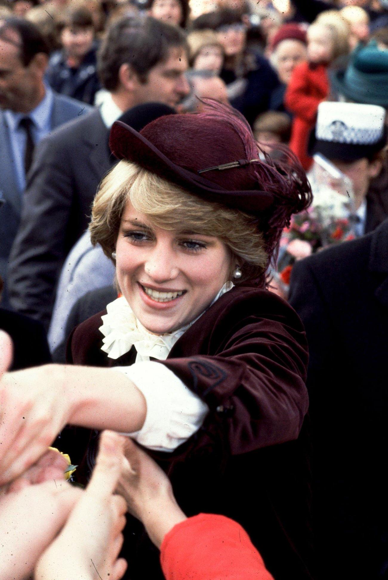 #50 Diana, Princess of Wales 1981. She is wearing a plum-coloured hat by John Boyd.