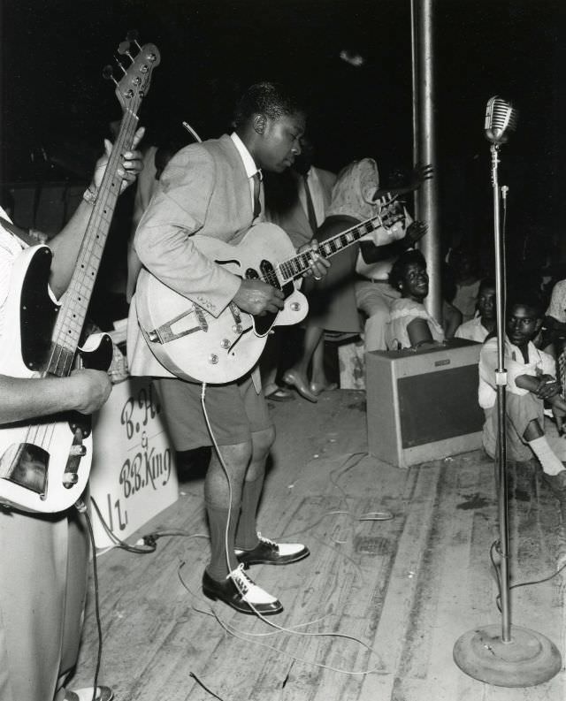 #8 BB King on stage at the Hippodrome, Beale Street in Memphis, Tennessee, with Bill Harvey, 1950.