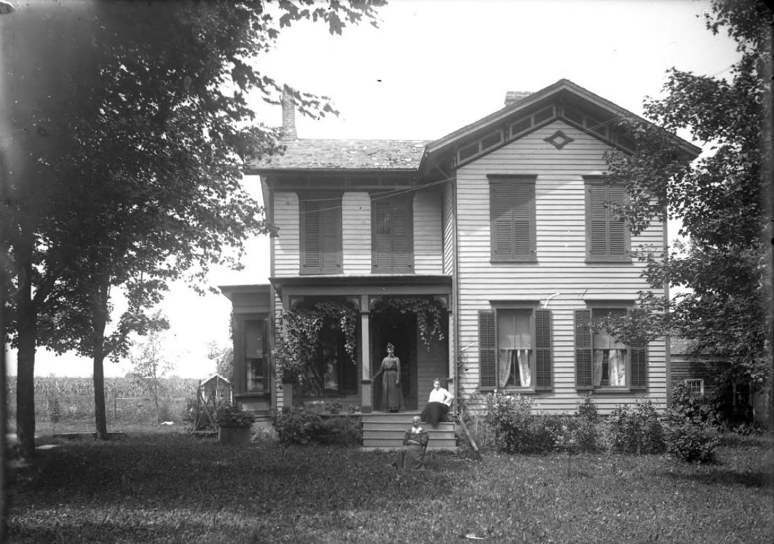 #143 Family in Front of a Farmhouse, 1900