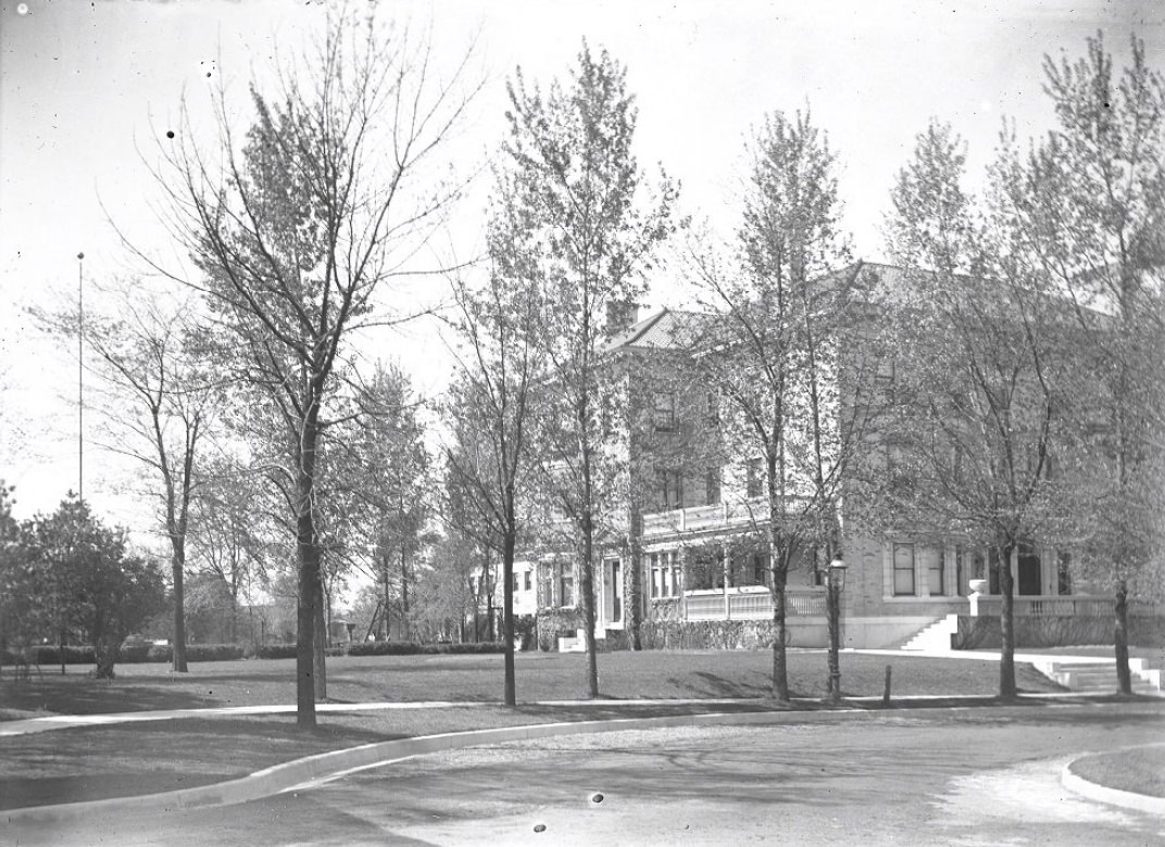 #149 Street view photograph of large homes in a suburban area, 1900.