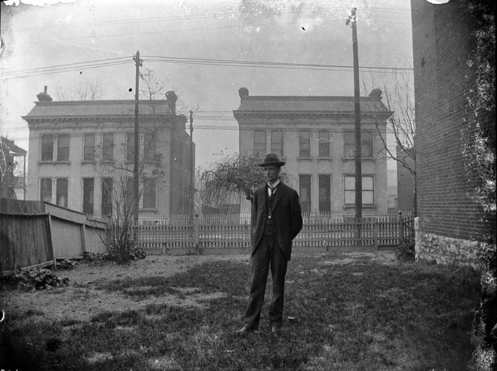 #198 Edmund poses in suit and hat in winter, 1900
