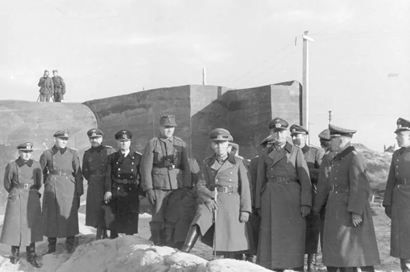 #3 Field Marshal Erwin Rommel visiting the Atlantic Wall defences near the Belgian port of Ostend, part of the fortifications which today comprise the Atlantic Wall Open Air Museum at Raversijde