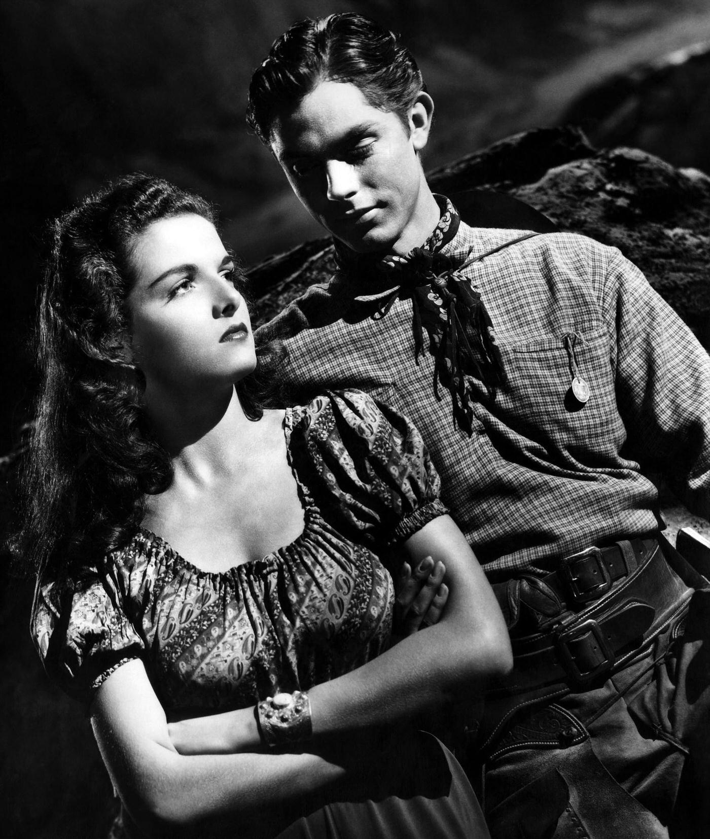 Jane Russell and Jack Buetel in a portrait session for the movie “The Outlaw”, 1943
