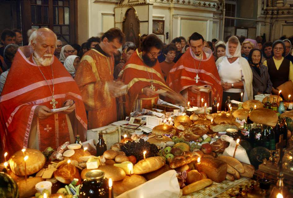 #17 Odessa. Orthodox priests bless the food for Easter.