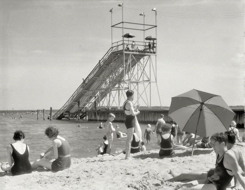 #21 “Beach with sunbathers.” Chapel Point, Washington’s “playground on the Potomac” near La Plata, Maryland, 1940