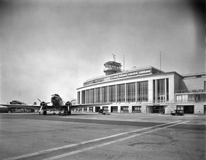 #28 Plane in front of the passenger terminal at the National Airport, 1941