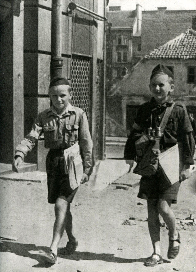 #16 Boy scouts delivering insurgent newspapers in the Powiśle district.