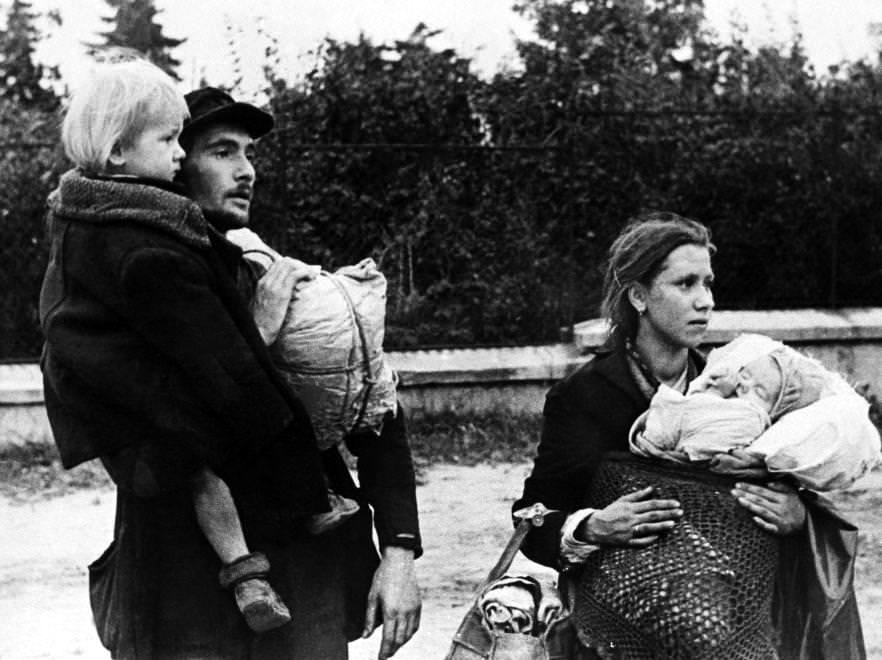 #28 Local residents abandoning the Wola district of Warsaw and heading towards the city center.