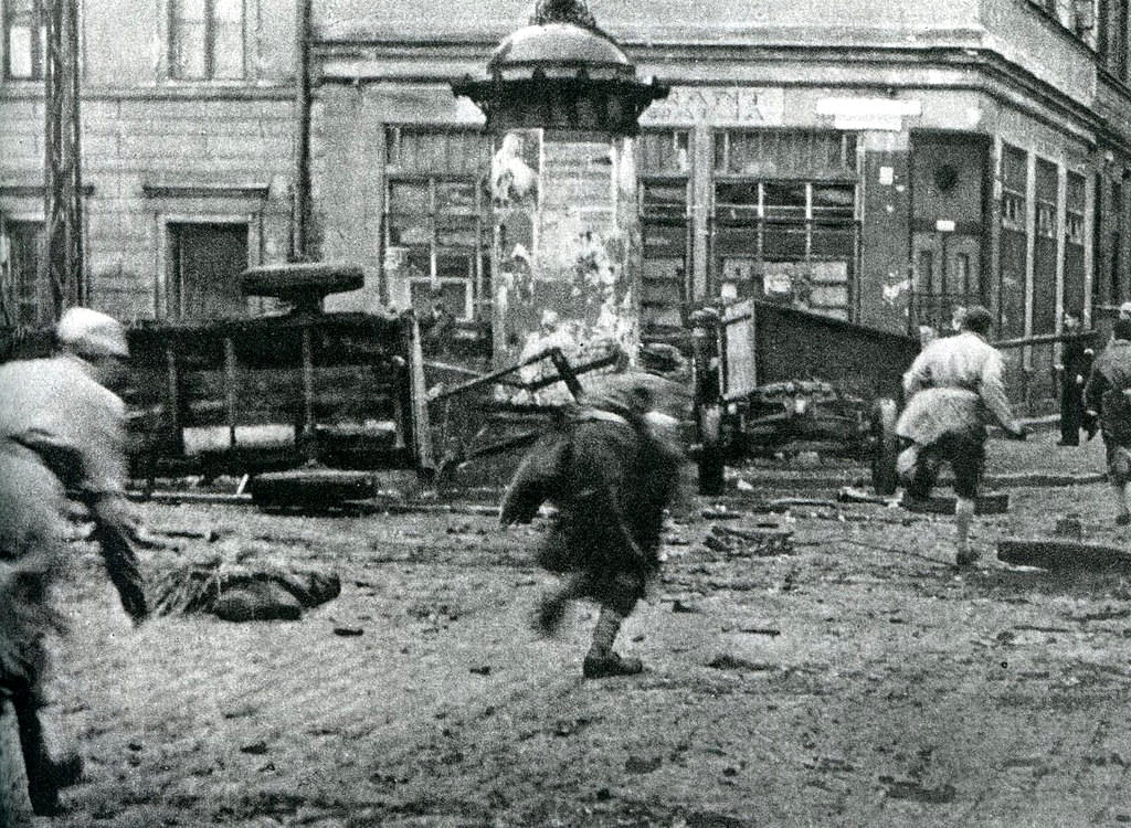 #36 Polish partisans from the Pięść battalion crossing Chłodna Street in the Wola district.