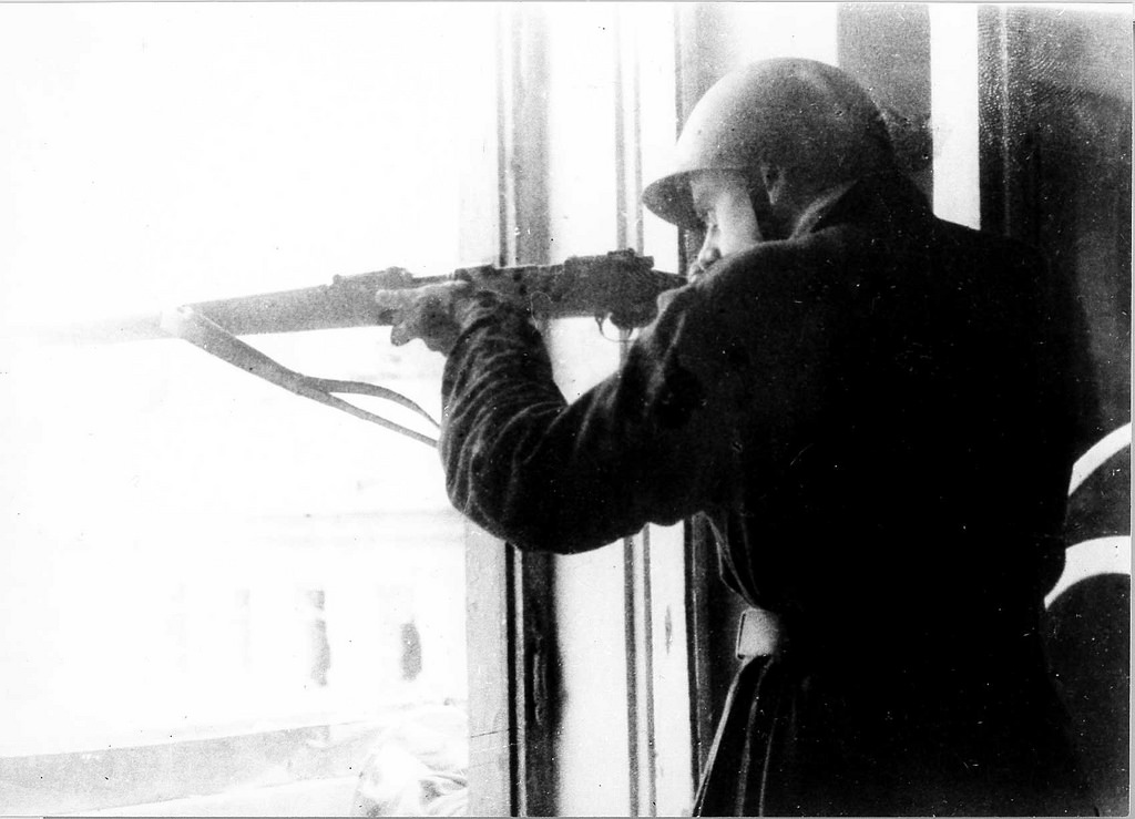 #5 A Polish partisan in shooting position.