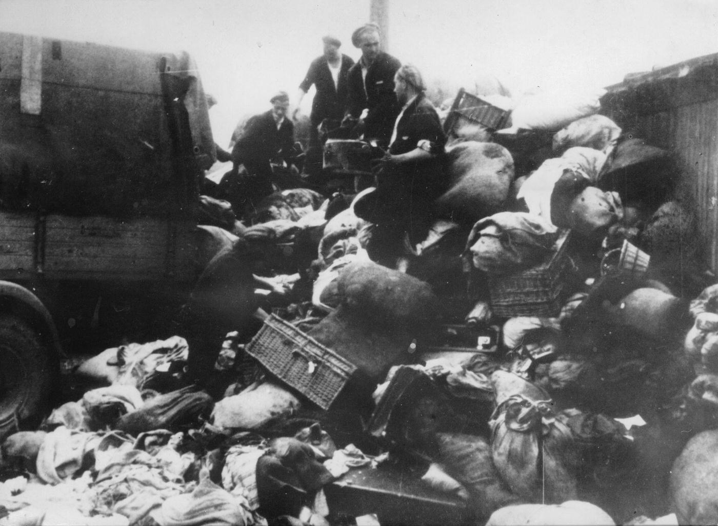 #56 Belongings of deported Jews is searched for valuables, 1944