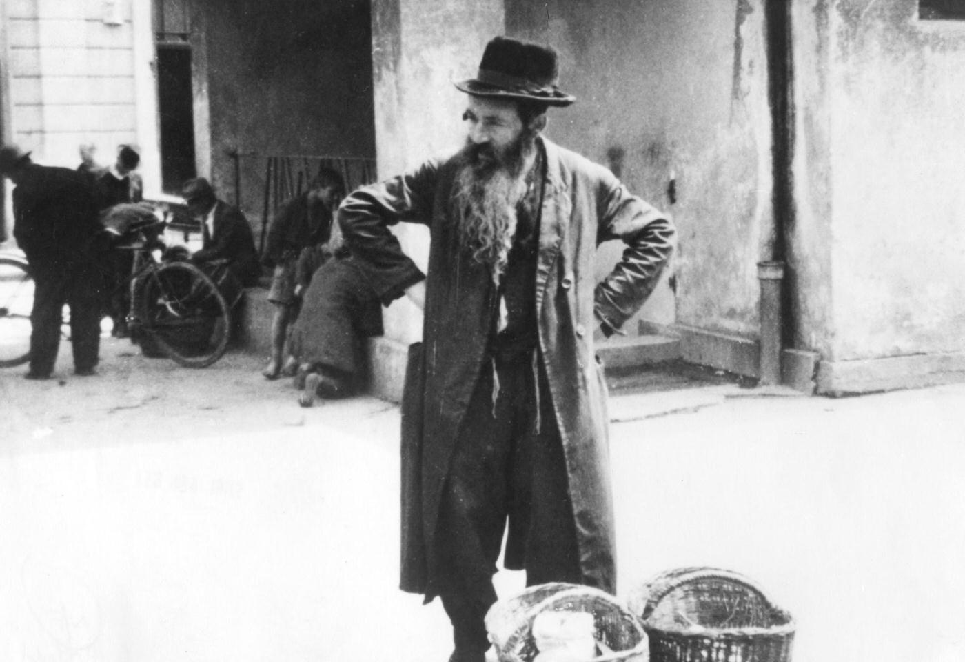 #76 Jewish peddler selling potatoes, Warsaw Ghetto, Poland, 1942